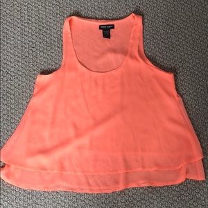 Simple orange blouse that has never been worn